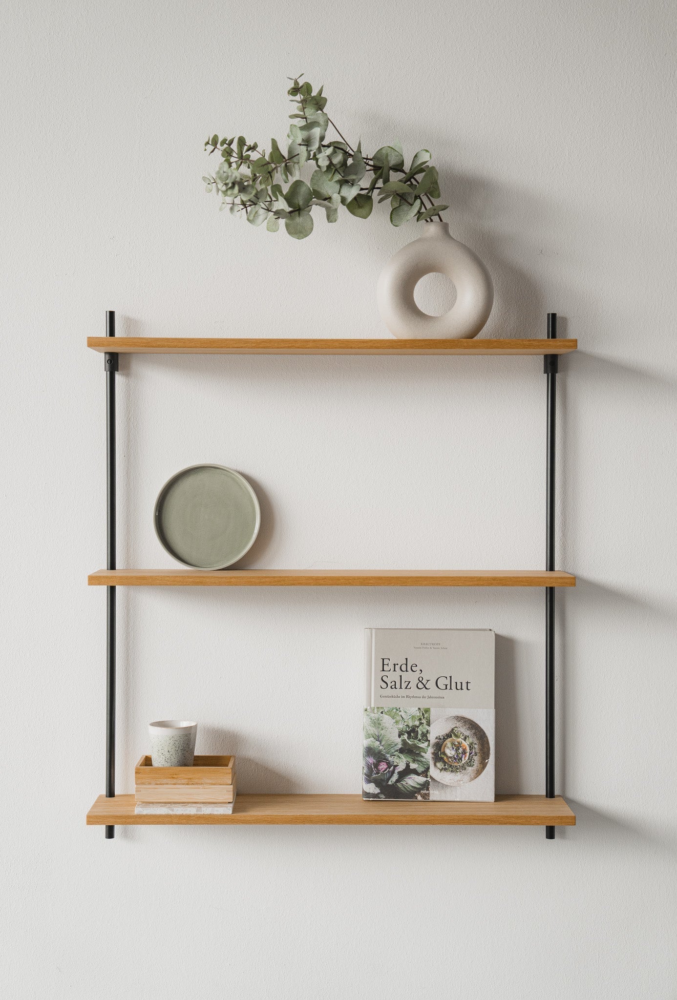Floating oak hanging wall shelf — KUUDU modular shelving system for living room and bedroom