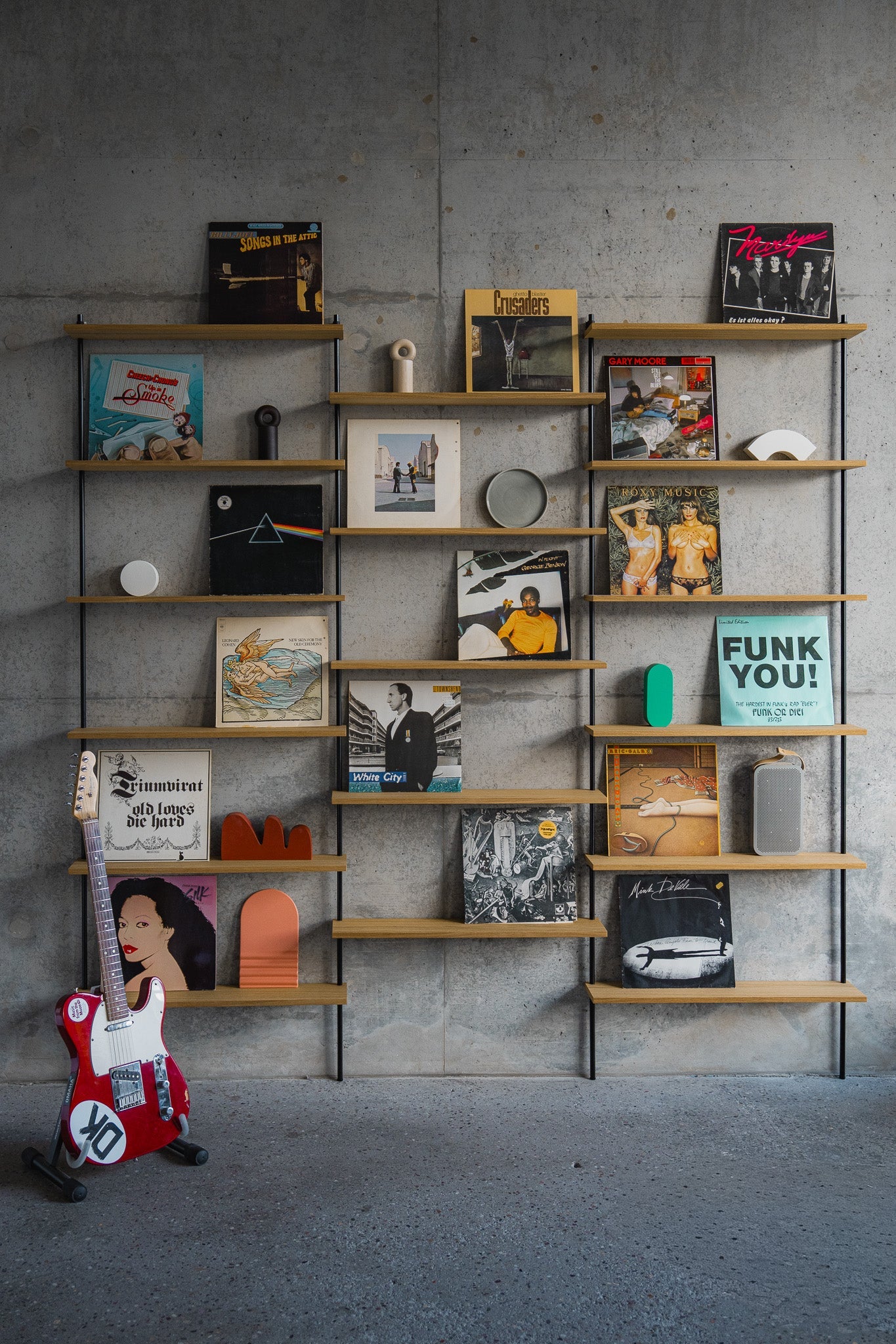 Large triple-section oak wall shelf with offset levels — KUUDU modular shelving system